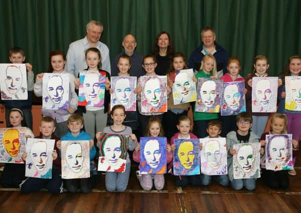 Ross Wilson, artist, pictured with children and leaders during the CS Lewis Project at Coleraine Methodist Church Hall on Saturday. INCR48-318PL