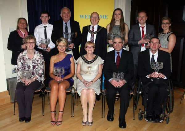 Flashback: Mayor of Ballymena, Cllr. Audrey Wales, and Deputy Mayor, Cllr. Hubert Nicholl, with the winners from last year's Ballymena Sports Awards. INBT06-234AC