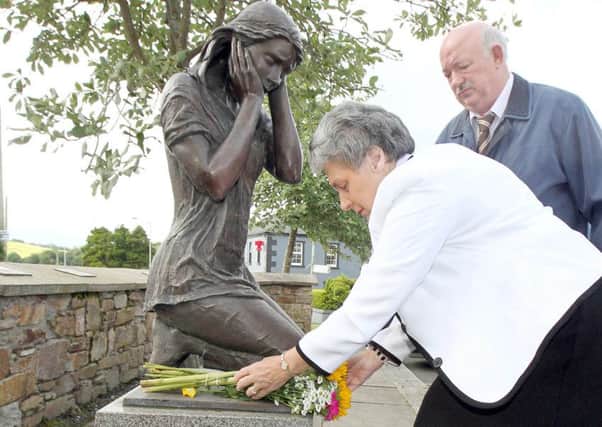 Mary Hamilton, who was injured in the bomb and David Temple who lost his brother William, at the Claudy Bomb Memorial. Picture Margaret McLaughlin