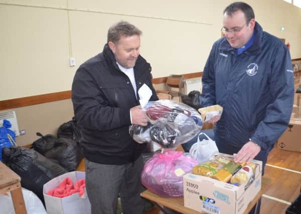Rev Mark Greenstreet and  Rev Mark Lennox with some of the donations.