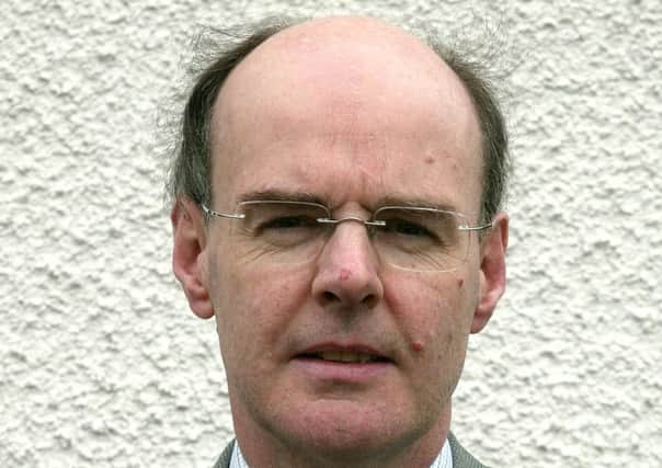 Councillor Declan O'Loan (editorial image).