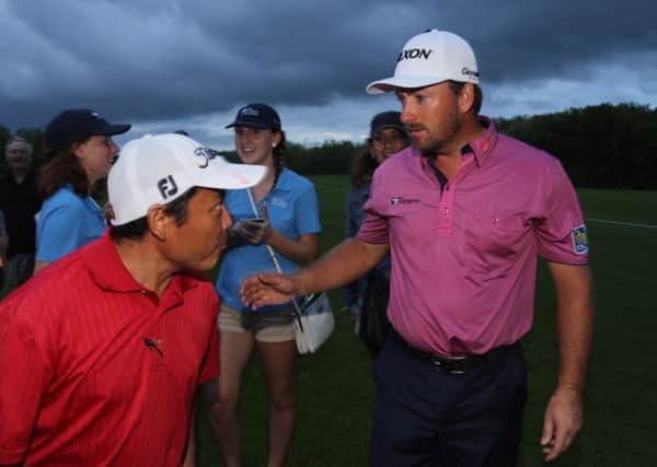 Graeme McDowell from Portrush, Northern Ireland chats with the people during the OHL Classic at Mayacoba golf tournament near Playa del Carmen, Mexico