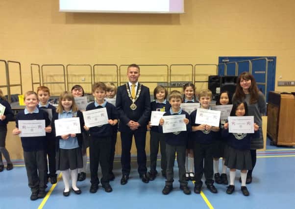 The school council: Luke Houston, Noah Gordon, Isabella Anderson, Adam Cairns, Adam Hewitt, Sinead Quah, Samuel Hobson, Shannen Kelly, Jamie McRoberts, Maeve Quah, TJ Hamilton-Withers and Evie Murray with Miss Sherwin and Councillor Thomas Hogg. INNT 42-802CON
