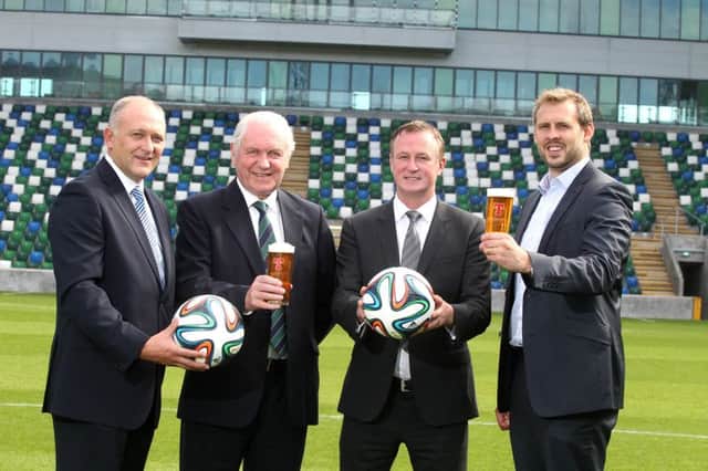 Pictured kicking of the new deal are Jeff Tosh, Sales Director, Tennents NI; Jim Shaw, President of the IFA; Michael ONeill, Manager of the Northern Ireland Football Team; and Brian Beattie, Marketing Director, Tennents NI.