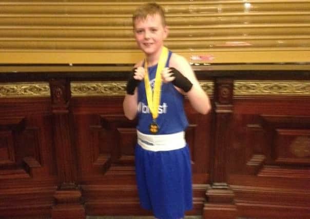 Oran Carton delighted after he claimed the boy 1.39kg Ulster Novice title.