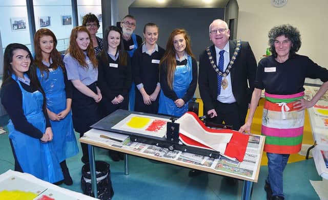 Mayor of Mid and East Antrim, Councillor Billy Ashe, at a printing workshop in the Braid Arts Centre, Ballymena, with St Louis Grammar School pupils.  INBT 47-806H