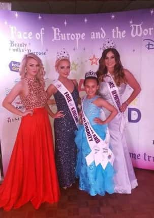 Ciara DeCarteret, Katie McGibbon and Anouska Black are pictured with Face of NI Director, Hayley McDonald, after the three were crowned in Paris.