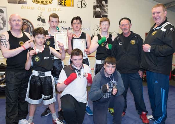 Winners and beaten finalists in the recent Armagh and Down Open Championships together with coaches of Craigavon Boxing Club. INLM4715-411