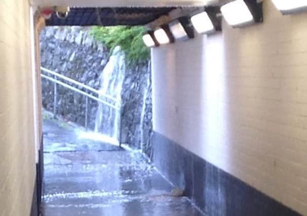 (file photo) Action has been taken to prevent a repeat of last month's flooding at Greenisland Station underpass .  INCT 48-720-CON