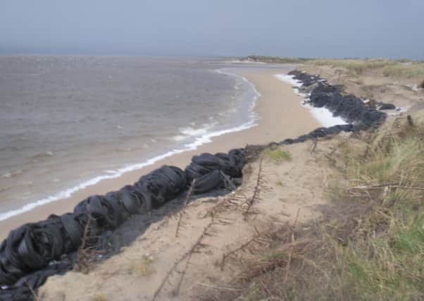 A DoE photo shows some of the tyres used in the unlawful sea defences constructed along a portion of the banks of the Foyle.