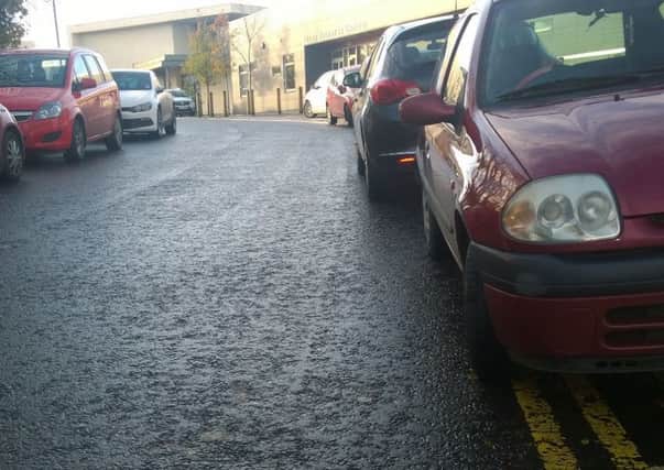 Cars were parked on double yellow lines.