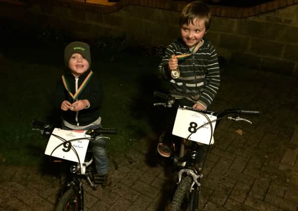 Young Foyle Cycling Club members Evan Wynne (aged 5) and his brother Ashton (3) after their first Cyclo-Cross race in Dublin a few weeks ago.