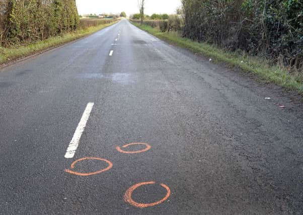 Police forensic markings on the Moy Road near Scotch St where a pedestrian was killed after being hit by a car on Tuesday evening. INPT48-228a.