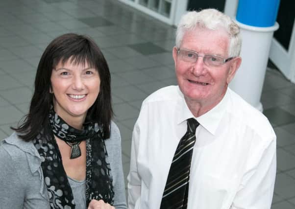 Joe Reid and Roberta Cooney of the Carrickfergus Support Group for Concern Worldwide. INCT 24-492-RM