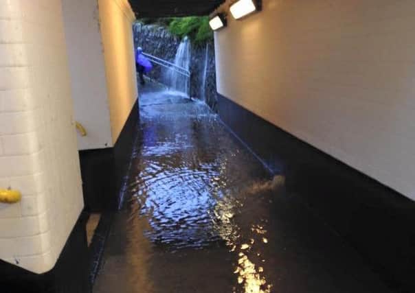 Flooding at Greenisland underpass.  INCT 48-727-CON
