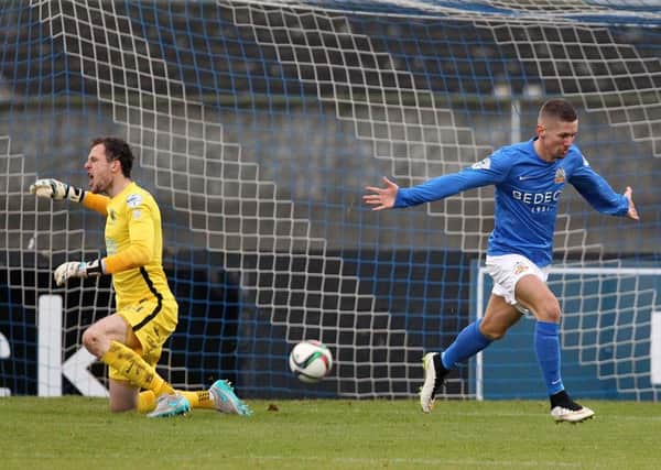 Daniel Kearns scores the opening goal against  Linfield     during Saturday's Danske Bank Premiership match at Mourneview Park.Picture by Brian Little/Presseye
