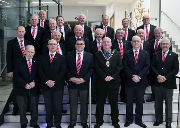 Members of the Ballymena Gospel Male Voice Choir pictured on Friday night with Mayor Billy Ashe in the Braid Arts Centre where they were treated to a special reception. INBT 47-815H