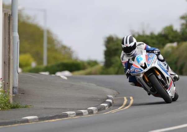 William Dunlop on the CD-IC Racing Yamaha at Kirk Michael during practice at the Isle of Man TT.
