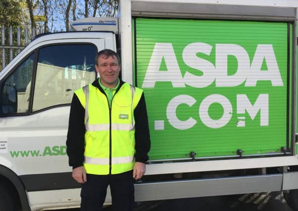 Good Samaritan: Asda home shopping driver John Rodger who came to a motorist's rescue after a road accident. INNT 48-814CON