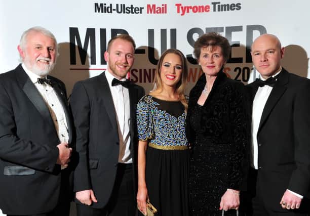 Lining up for the camera at the Mid-Ulster Business Awards gala night were Alfie Cockett, Mark Shields, Alana Johnston, Heather Shields and Paul Hunter.INMM4814-334