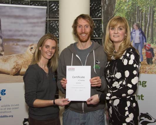Michael Close from Lisburn is congratulated by Sheila Lyons from Ulster Wildlife and Paula Smyth from Lantra having successfully completed a year-long Nature Skills traineeship with local nature conservation charity Ulster Wildlife.