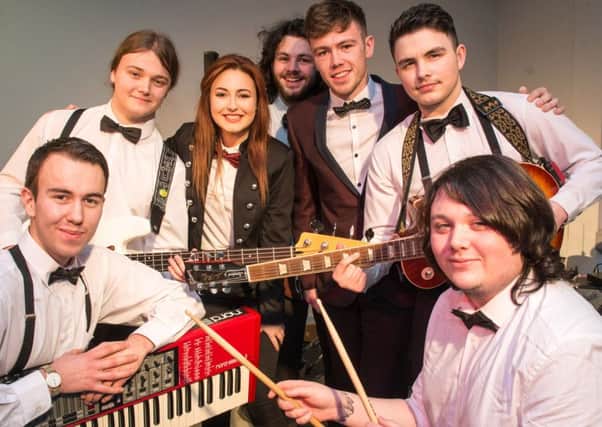 Stephen Doohan, back row third left, lead guitarist with band  Zippy Gnat, who has won gold at the Skills Show in Birmingham. Photo: Martin McKeown