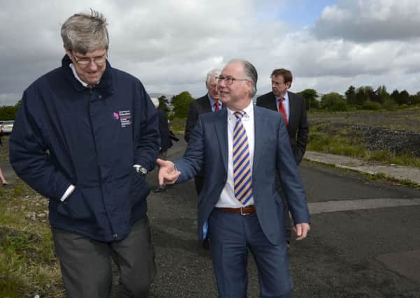 Nigel Dougherty, Principal of Ebrington Primary School, chatting to Education Minister, John Oâ¬"Dowd MLA, when he arrived for the cutting of the first sod on the site of the new Foyle College and Ebrington Primary School buildings at Caw on Thursday. INLS2215-113KM