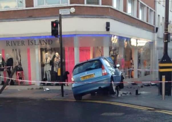The scene after a car crashed into the bollards at the top of Bow Street.