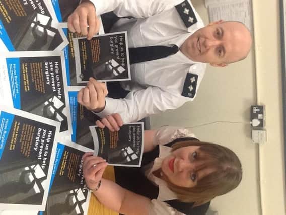 PSNI Inspector Jon Burrows and Armagh, Banbridge and Craigavon Policing and Community Safety Partnership Manager Patricia Gibson launch Top Ten Tips to beat the burglar.