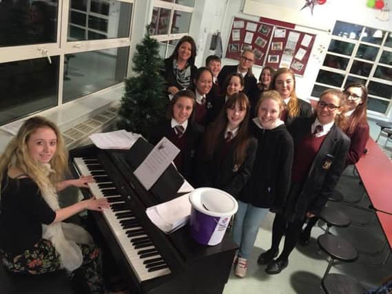 Ulidia Integrated College choir members entertaining visitors at the canteen. INCT 48-754-CON