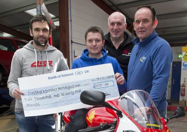 Pictured receiving the cheque is William Dunlop with Joey's son Gary Dunlop, Noel Johnston, Clerk of the Course at the Ulster Grand Prix and Russell Shiels.