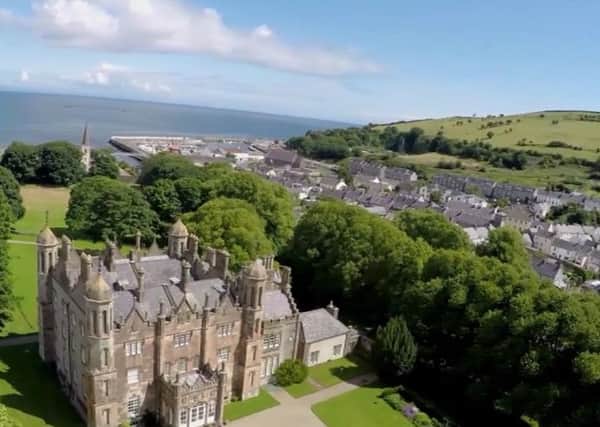 A spectacular view of Glenarm Castle and the village in the background.  INLT 49-670-CON