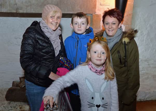 Pictured at the St Andrew's Day celebrations in Carrickfergus Castle are Kathleen Coulter and Michelle McDowell with Zak and Kate Fairless. INCT 48-031-PSB