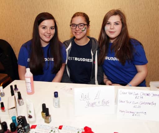 Alice Skelton, Kirsty Wallace and Cara Dorrens (Best Buddies) pictured during the Can Can Recycling Bazaar in the Lodge Hotel on Saturday. INCR50-306PL