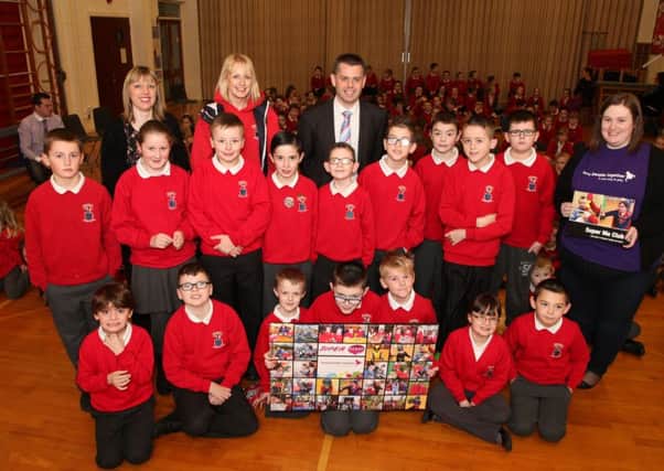 Ballysally Primary School pupils who took part in the Mencap Super Me Project. Included are; Janette Connor, Mencap representative, Mr. Dunn, principal, and Jane McCafferty and Mandy Dinsmore, teachers. INCR50-300PL