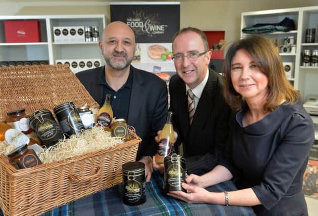 Pictured (centre) is Des Gartland, Invest NI, with Nicholas & Michelle Lestas, co-founders of The Good Food & Wine Company. inbm50-15