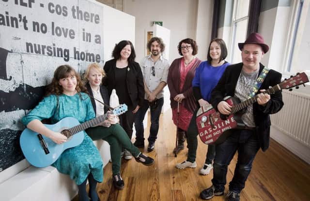 Chris Ledger, CEO of Arts & Disability Forum (fifth from left)  with some of the artists who benefited from the iDA scheme last year. (left to right) Catherine Hatt, Ursula Burke, Paul Moore, Sinead O'Donnell and Jim McClean