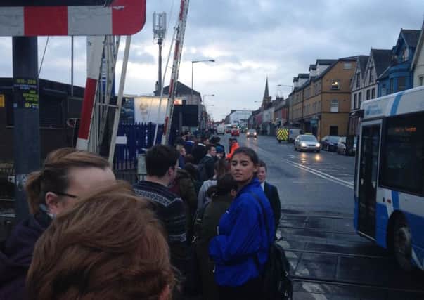 Just some who were waiting in the rain for trains after signal failures caused major delays