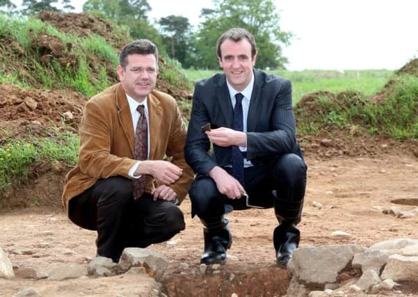 Foundations of a house thought to belong to the Gaelic O'Hagan clan, some 700 years ago, have been uncovered by Department of the Environment at Tullaghoge. Principal Archaeologist Dr John O'Keeffe with Environment Minister Mark H Durkan. Presseye