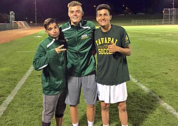 Niall Logue (centre) with Yavapai College team-mates Ather Dawood (left) and Scotty Robles after another win this season.