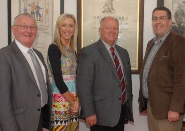 Carla Lockhart with MLAs Sydney Anderson (left) and Stephen Moutray (right), and MP David Simpson