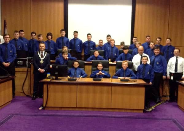The officers and boys of 16th Newtownabbey BB company with Mayor Thomas Hogg in the council chamber at Mossley Mill. INNT 50-513CON