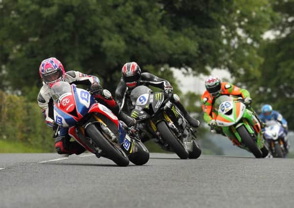 Lee Johnston leads Ian Hutchinson, Glenn Irwin and Dean Harrison in the Supersport class at the Ulster Grand Prix in August.