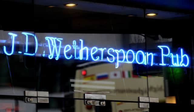 File photo dated 20/1/09 of a JD Wetherspoon pub in central London as the pub giant became the latest firm to warn over government plans to boost wages for low-paid workers as it claimed the living wage would add "considerable uncertainty" to the under-pressure sector. PRESS ASSOCIATION Photo. Issue date: Wednesday July 15, 2015. Wetherspoon chairman Tim Martin hit out at "capricious" government initiatives after Chancellor George Osborne last week unveiled a compulsory living wage of £7.20 an hour for over-25s from April next year, rising to £9 by 2020. See PA story CITY Wetherspoon. Photo credit should read: Tim Ireland/PA Wire