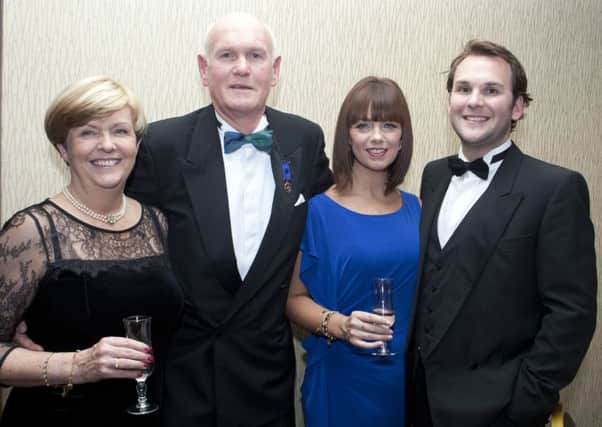 LIKE FATHER...Dr John Flynn and his wife Sharon, pictured with their son Steven and daughter-in-law Fiona on Saturday night.INBM48-15 042SC.