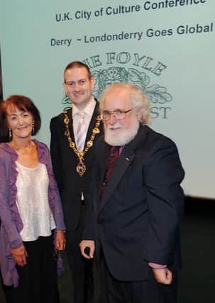 Derry, New Hampshire's official Town Historian, Richard Holmes (right) with Nuala McAllister Hart, Chairperson of Foyle Civic Trust, and former Mayor Martin Reilly.