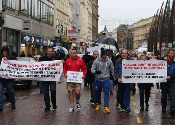 A group called the Protestant coalition hold an anti-refugee protest in Belfast city centre. PRESS ASSOCIATION Photo. Picture date: Saturday December 5, 2015