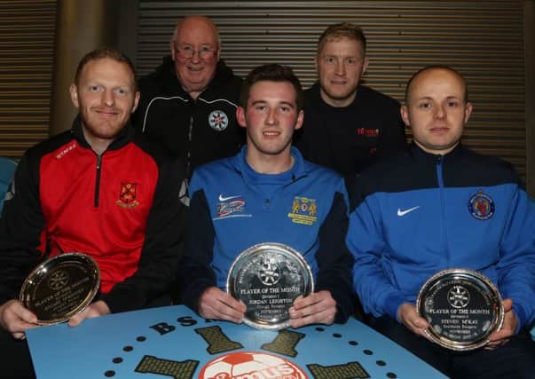 Jordan Leighton (centre) of Clough Ranges who won the Firmus Energy Ballymena Saturday Morning League Player of the Month award for November is seen here with Division Two player Stuart McKinney of Ahoghill Rovers and Division 3 player Steven McKay of Soughside Rangers. Also included are Ballymena Saturday Morning League secretary Brian Montgomery and Donald Crawford from Firmus Energy. INBT 50-183CS
