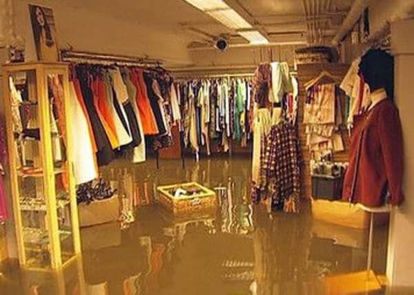Shops were flooded with two feet of dirty rain water