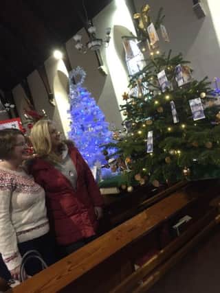 Viewing the Christmas Trees at All Saints Tullylish were Marshall Heather Wilson and Jo-Anne Dobson MLA.